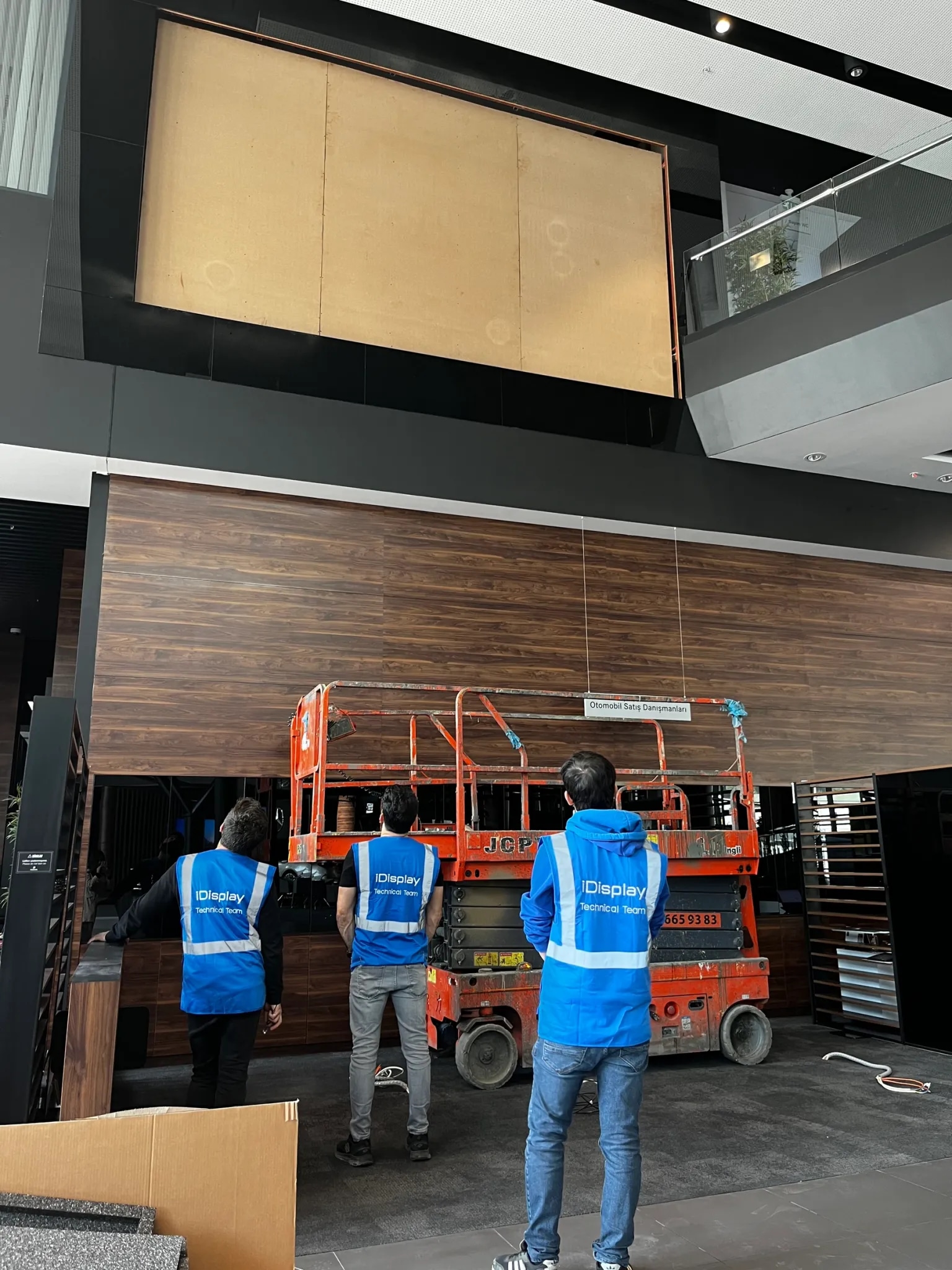 Preparing a giant LED screen in a showroom